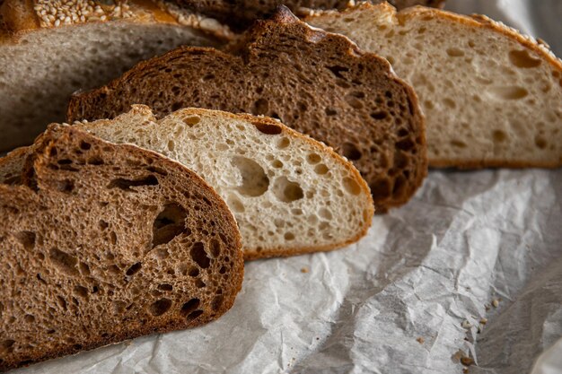 Healthy rye bread slices on the plate on concrete background