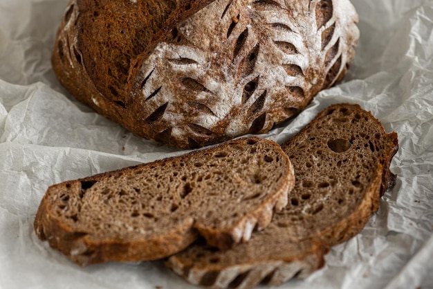 Healthy rye bread slices on the plate on concrete background