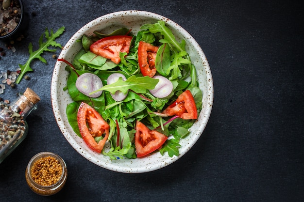 healthy salad tomato, mix leaves, onions and other ingredients