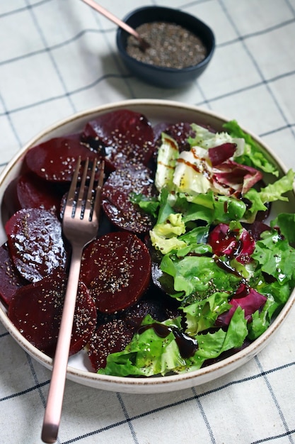 Healthy salad with beets and fresh leaves Slimming salad with olive oil and lemon juice beets and lettuce