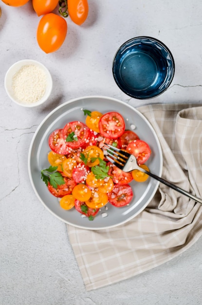 Healthy salad with red and yellow cherry tomato