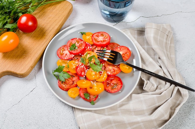 Healthy salad with red and yellow cherry tomato