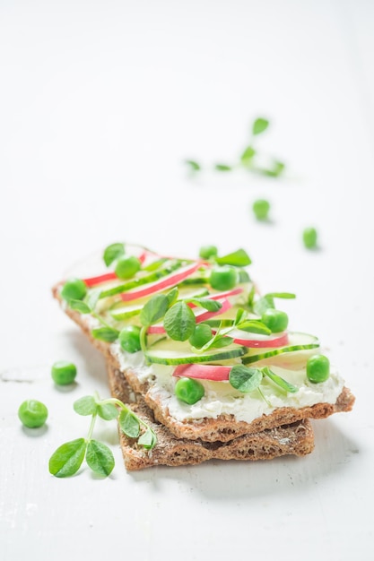 Healthy sandwich with crunchy bread fromage cheese and avocado