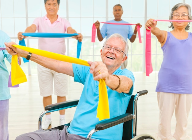 Healthy senior people at the gym