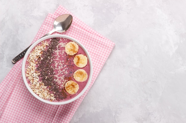  healthy smoothie bowl, breakfast on gray marble table