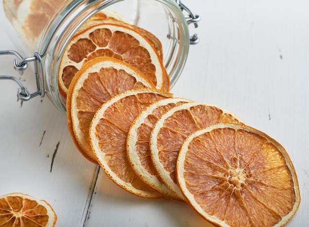 Healthy snack orange chips on white background