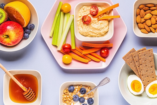 Healthy snack on a pastel background, top view.