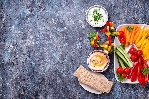 Healthy snacks. Vegetables and hummus