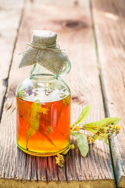 Healthy tincture in bottles as homemade cure in summer