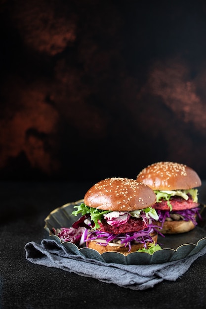 Healthy vegan beetroot burgers with red cabbage and lettuce