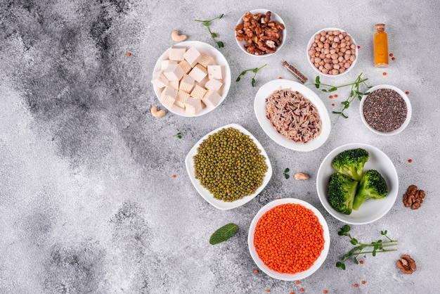 Healthy vegan food on a concrete background 