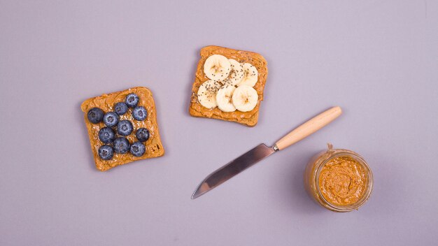 Healthy vegetarian breakfast with peanut butter, fruit and superfoods.