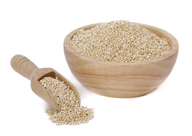 Healthy white quinoa seeds isolated on white background Healthy food habits and concept of balanced diet