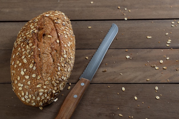 Healthy Whole Grain Loaf Bread Artisanal on a wooden table Copy Space