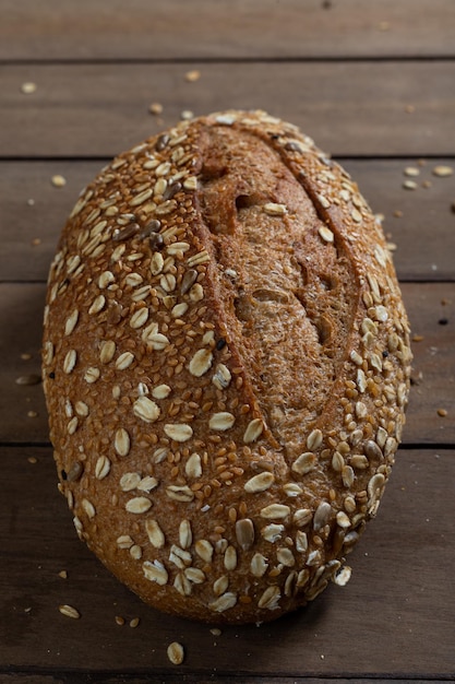 Healthy Whole Grain Loaf Bread Artisanal on a wooden table Copy Space