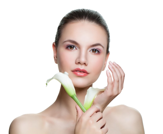 Healthy young woman with lily flower isolated on white background Facial treatment cosmetology beauty skincare and spa concept