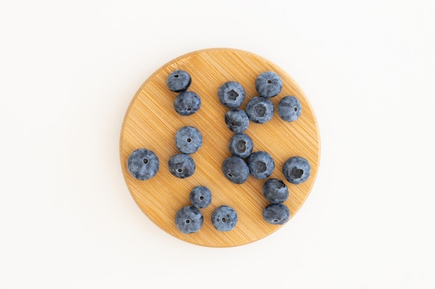 Heap of blueberries fresh berries isolated on white background top view