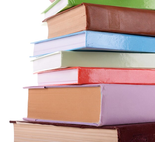 Heap of books on light background