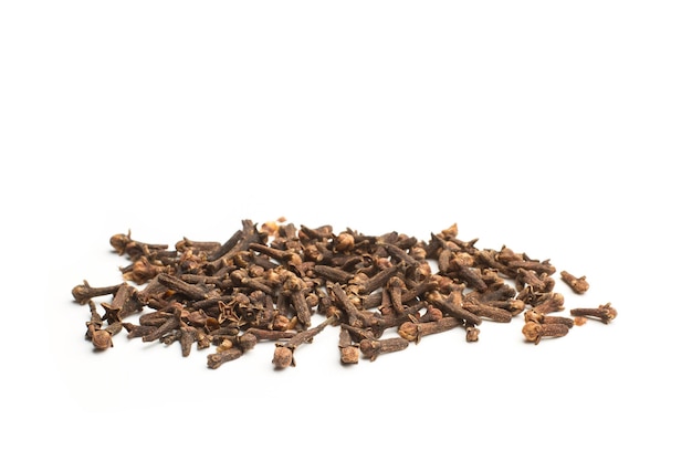 A heap of cloves on a white background with copy space