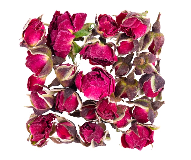 Heap of dry tea roses buds isolated on white background Rose flower tea Phnom Penh rose tea Clipping path Top view