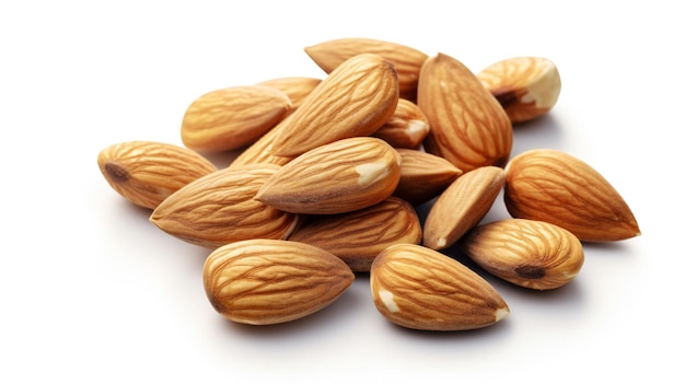 A heap of fresh almonds on a plain white background