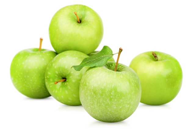 Heap of green apples on a white isolated background