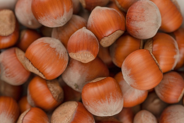 Heap of healthy hazelnuts in shell