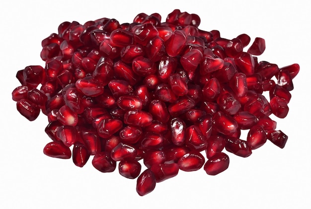 Heap of pomegranate seeds on a white background