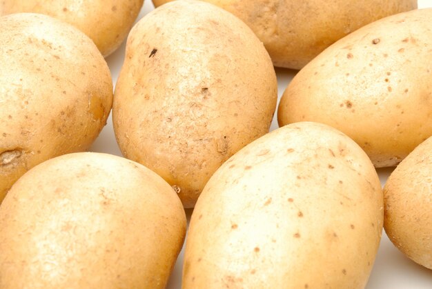 Heap of potato isolated on the white background