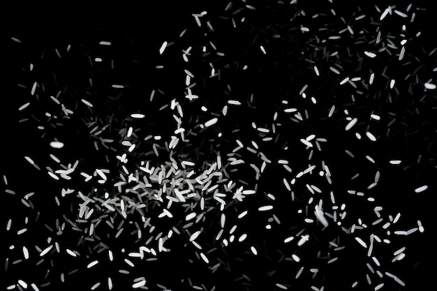 Heap of raw rice on dark background raw white rice explosion faling rice on black background