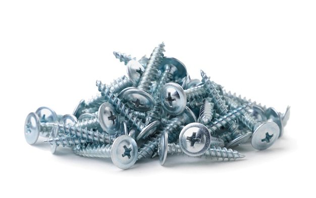 Heap of steel screws for metal close-up on a white background. Isolated