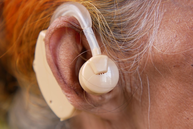 Hearing aid concept a senior women with hearing problems