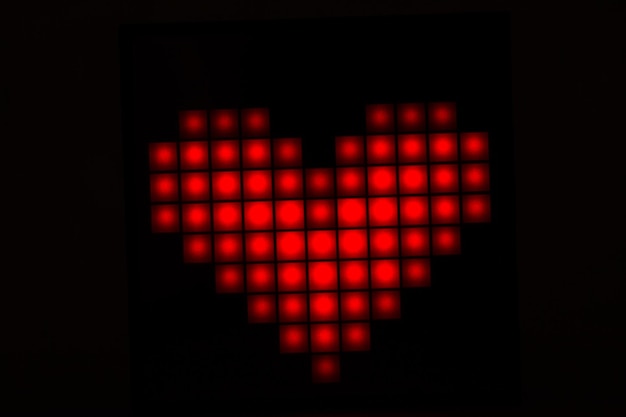 Photo heart closeup on a black background. valentine's day.