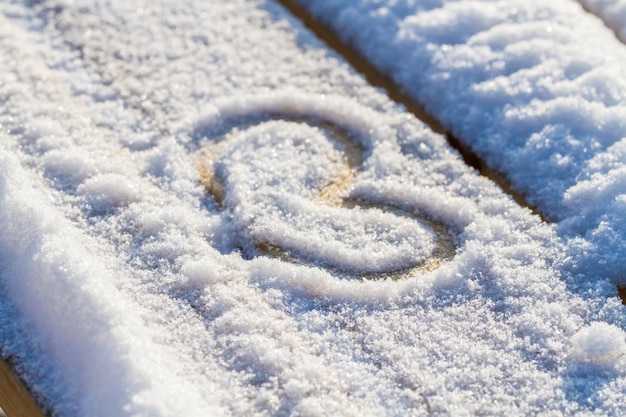 Heart drawing on the snow