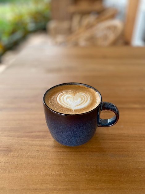 Heart latte art on coffee cup