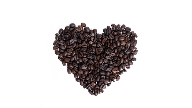 Heart made of coffee beans isolated.