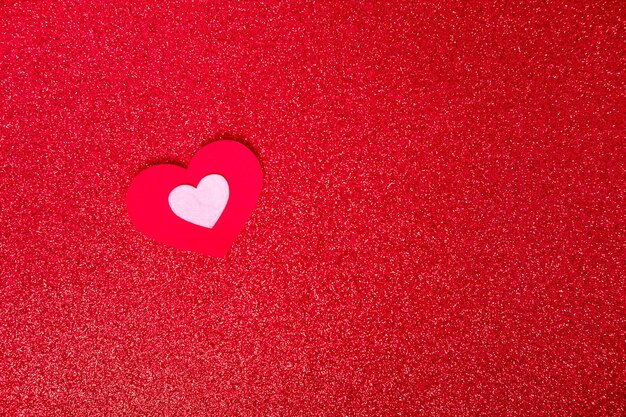 heart on a red background for a greeting card or banner for Valentines Day copy space