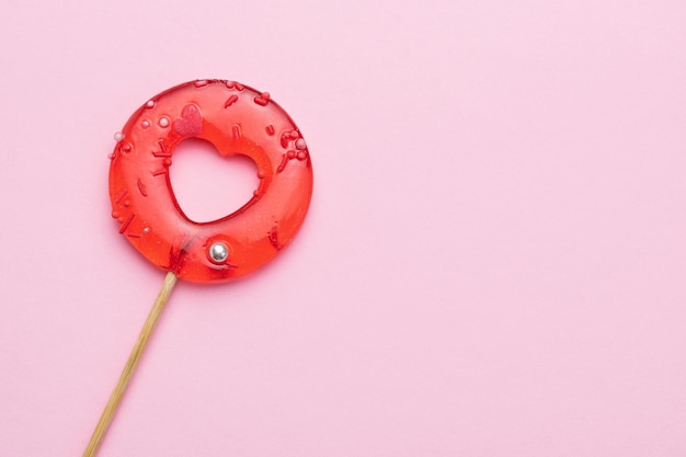 Heart Shape Candy On Pink BackgroundxA