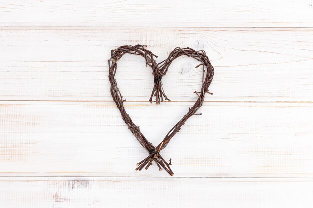 Heart shape made of natural twigs - sign of love