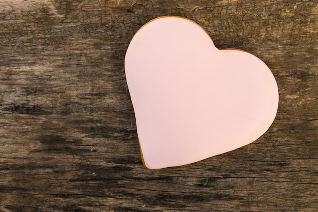 Heart shaped cookies for valentine day on rustic wooden table. Top view