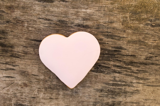 Heart shaped cookies for valentine day on rustic wooden table Top view