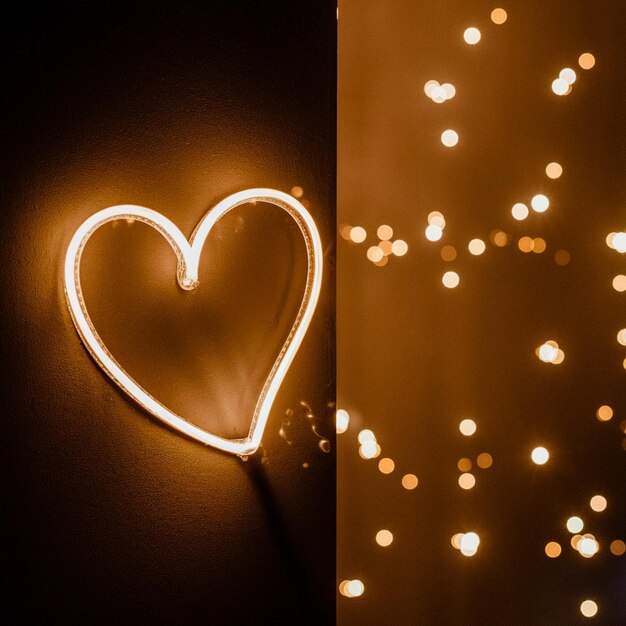 Photo a heart shaped decoration with a heart and a couple of lights