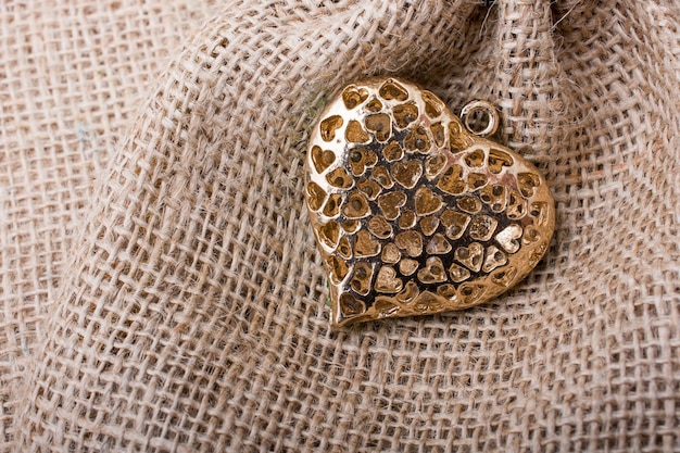 Heart shaped gold color metal object