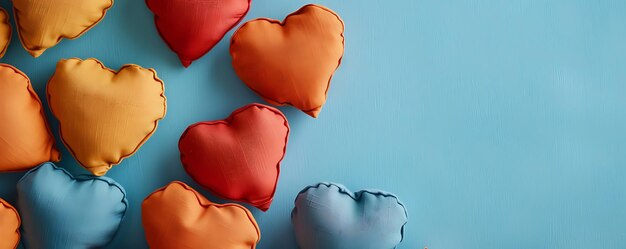 a heart shaped pillow with the word love on it