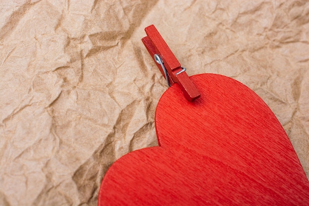 Heart with clothespin Valentine concept and promise of love