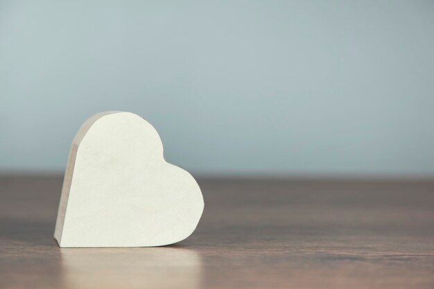 Heart on the wooden desk