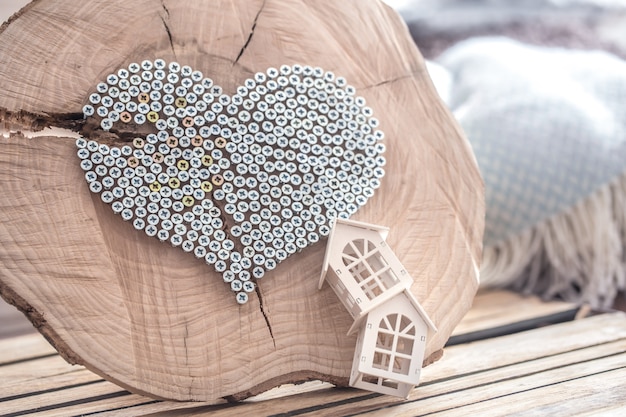 Photo heart on a wooden wall in the interior of the room