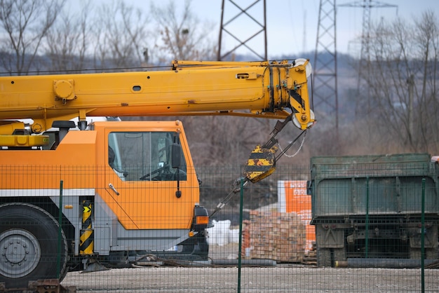 Heavy duty mobile lifting crane at construction site