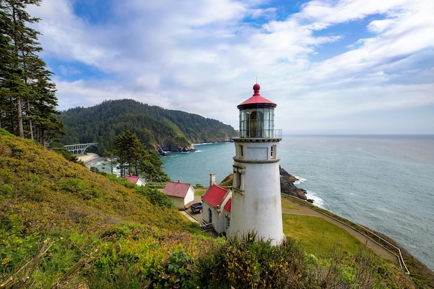 Heceta head lighthouse on a cliff in oregon overlooking the pacific ocean