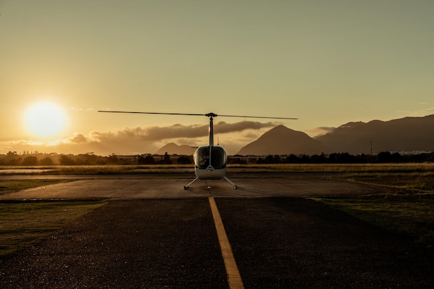 Helicopter at sunset Airfield